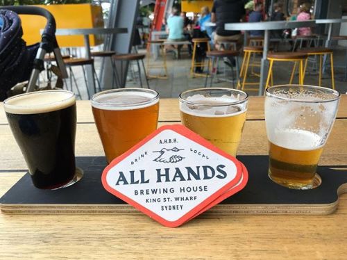 @allhandsbrewinghouse tasting paddle at King Street Wharf.